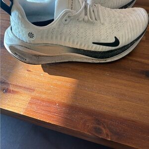 Nike Cream and Black Running Shoes